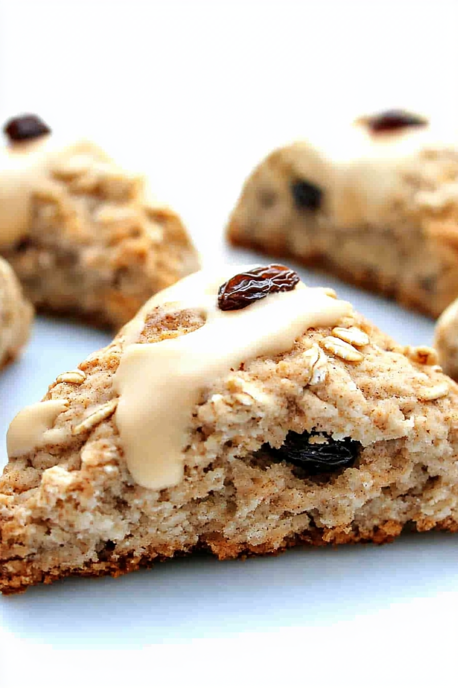 Close-up of golden-brown pastries with crumbly texture and glossy topping.