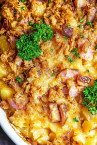 Comforting baked casserole with tender potatoes, savory ham, and a golden topping