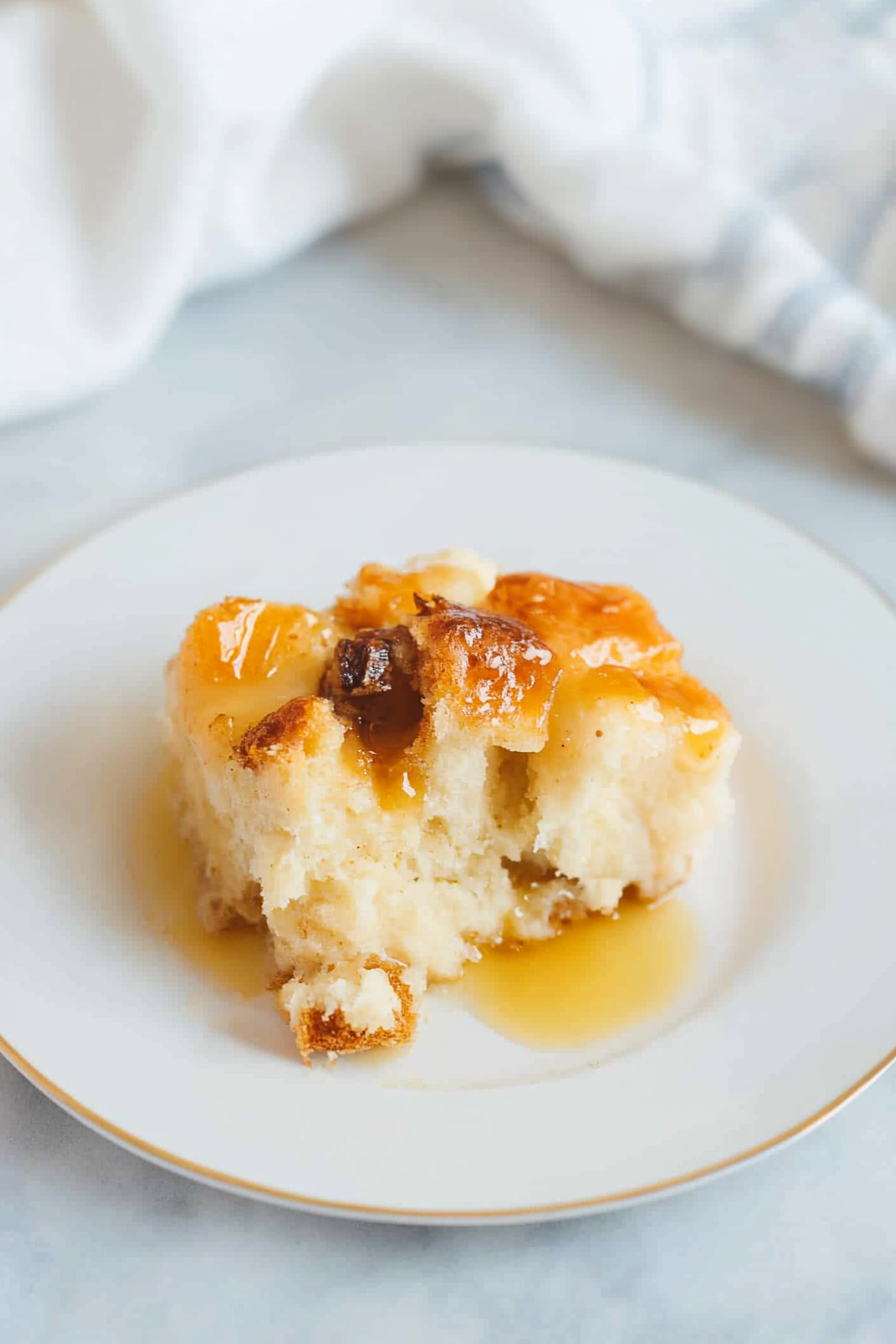 Comforting baked dessert with a soft, custardy texture and golden-brown top