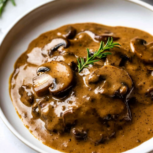 Hearty mushroom sauce with a velvety finish, perfect for serving over meats or potatoes.