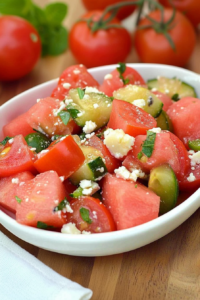Light fruit and veggie mix with watermelon, tomatoes, and a sprinkle of feta
