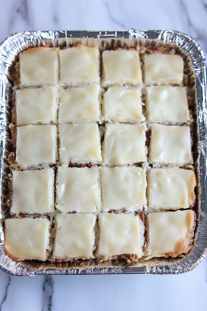 Freshly baked dessert highlighting the contrast between crunchy nuts and soft filling.
