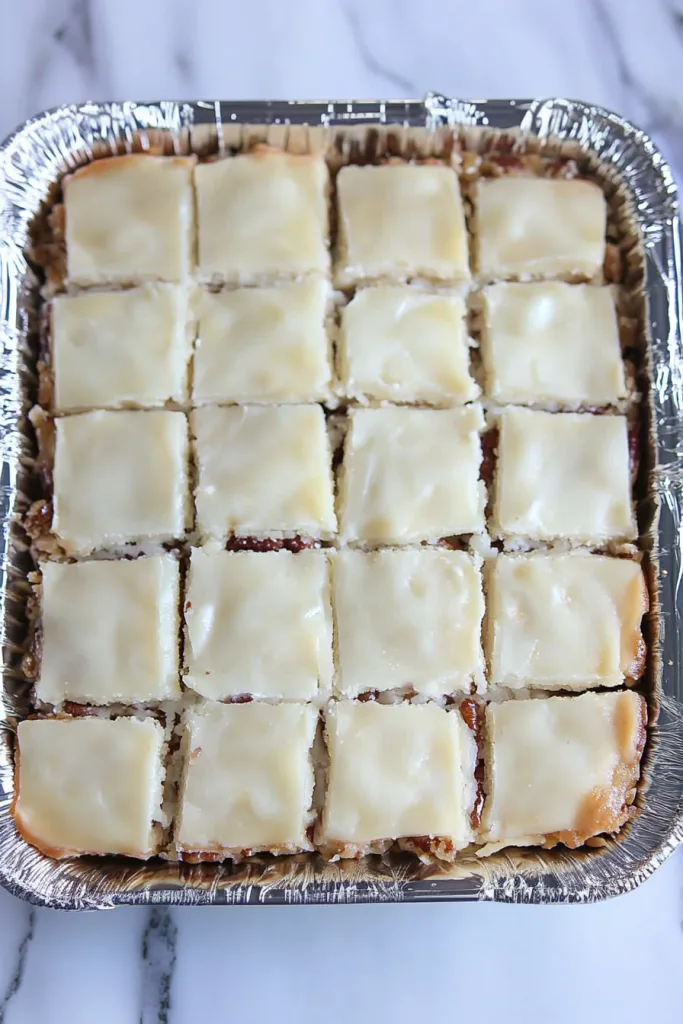 Freshly baked dessert highlighting the contrast between crunchy nuts and soft filling.