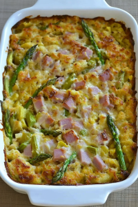 Golden baked casserole with melted cheese and crisp edges in a white dish.