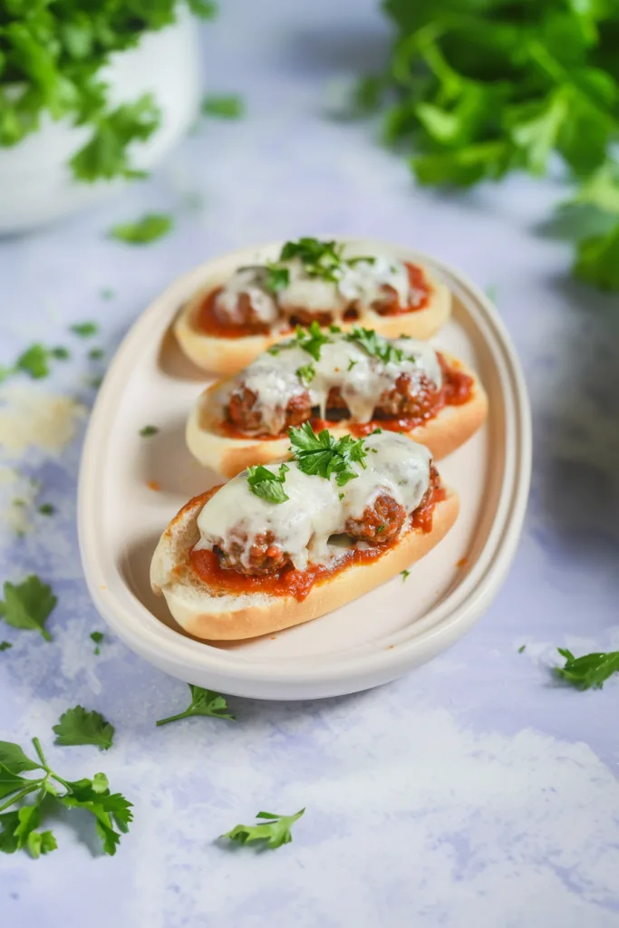 Hoagie-style sandwich filled with meatballs, marinara sauce, and melted cheese.