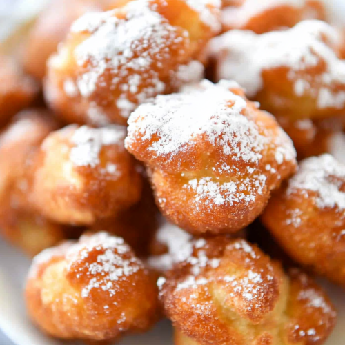 Warm fried desserts highlighting their golden crust and sweet finish.