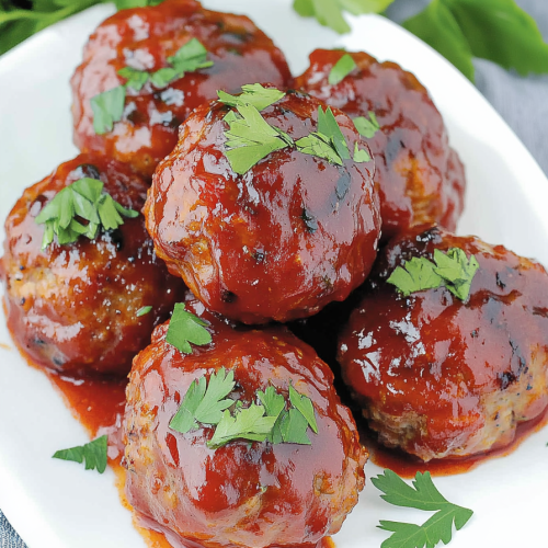 Small savory portions arranged neatly, highlighting their rich glaze and garnish.