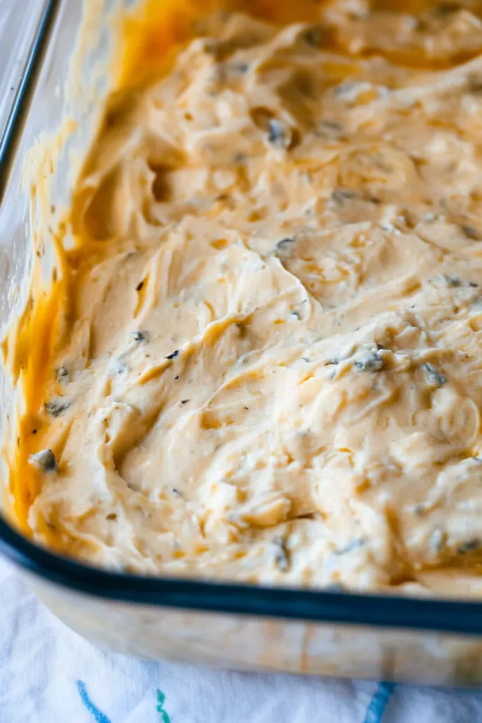 Finished cheese spread with a warm, inviting color, styled for supper club dining.