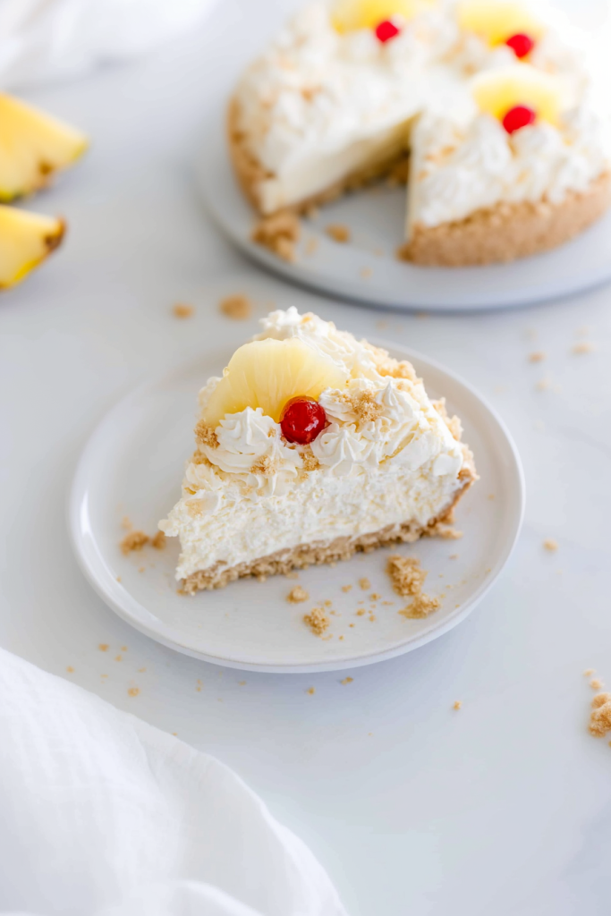 Beautifully decorated tropical-inspired dessert with pineapple garnish and creamy filling