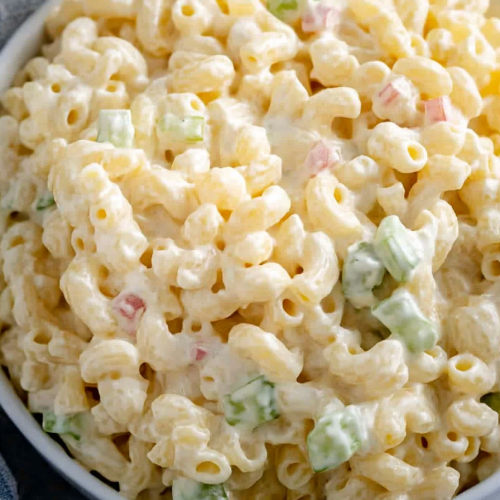 Final shot of Dolly Parton’s macaroni salad recipe, highlighting its creamy texture and fresh crunch.