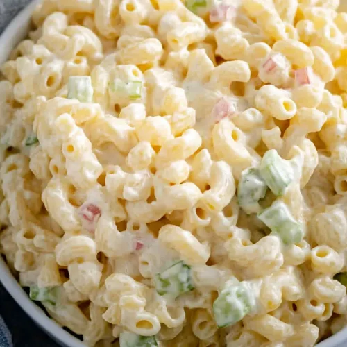 Final shot of Dolly Parton’s macaroni salad recipe, highlighting its creamy texture and fresh crunch.