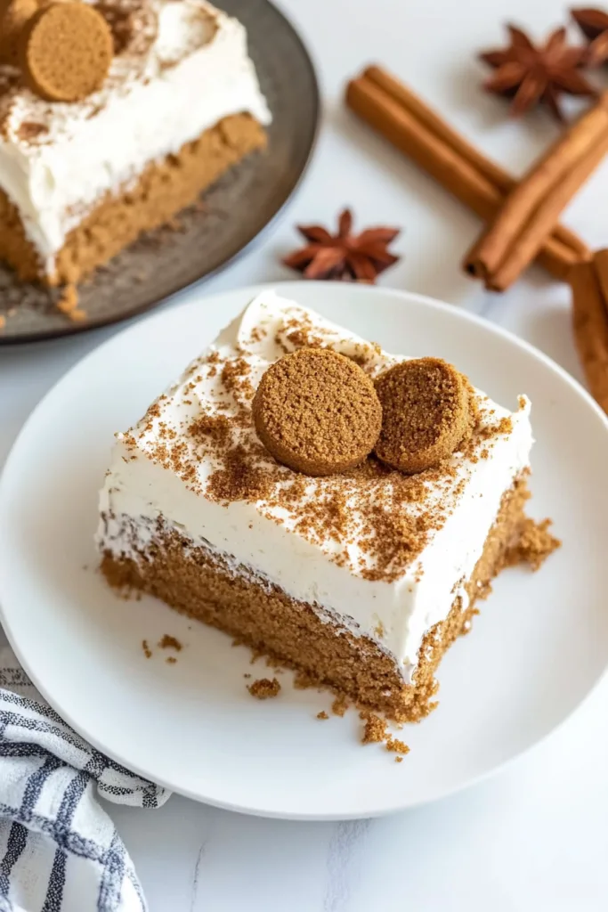 White plate holding dessert slice with smooth cream and crunchy crust.
