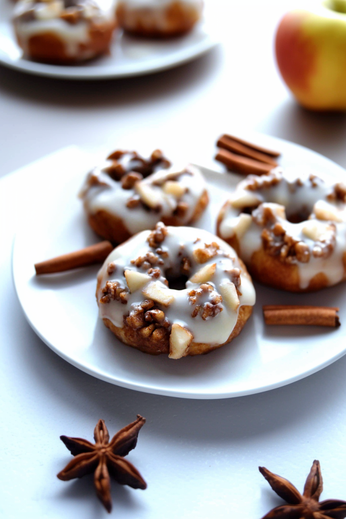Soft baked rolls highlighting golden crust and creamy icing