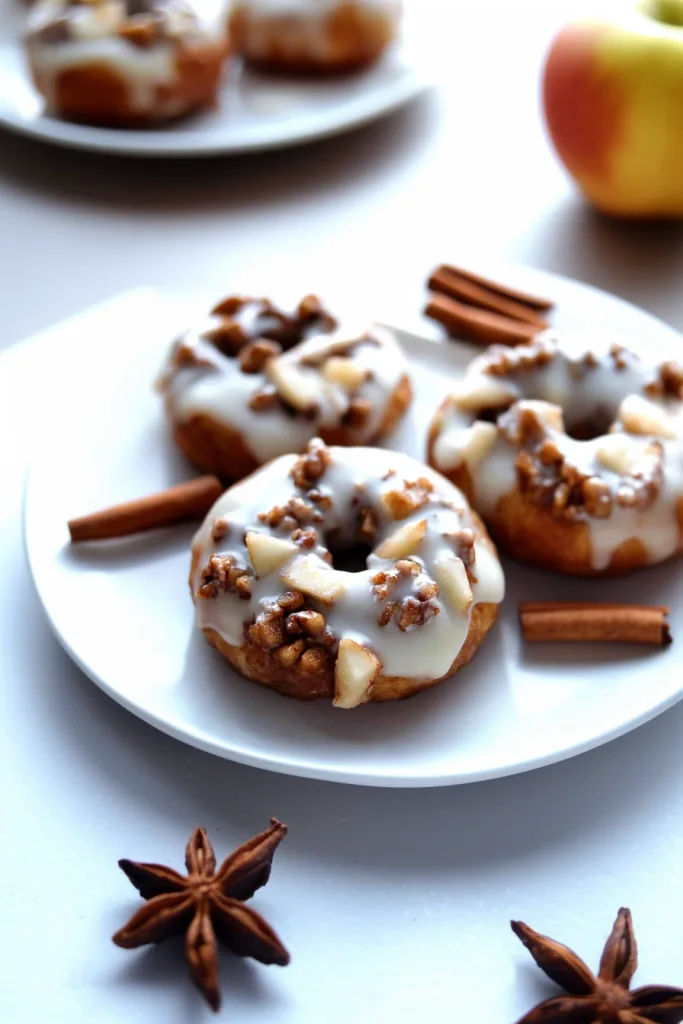 Soft baked rolls highlighting golden crust and creamy icing