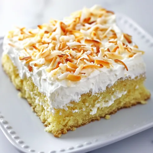 A slice of moist yellow cake topped with creamy frosting and toasted coconut flakes.