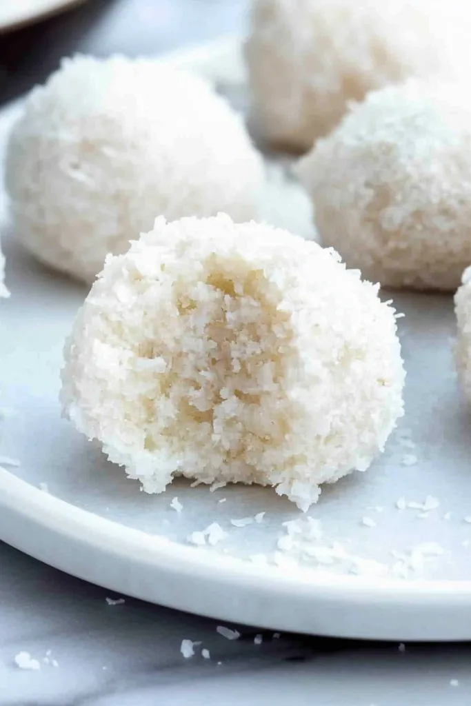 Lime Glazed Coconut Snowballs displayed in a group, emphasizing their bright, fresh look.