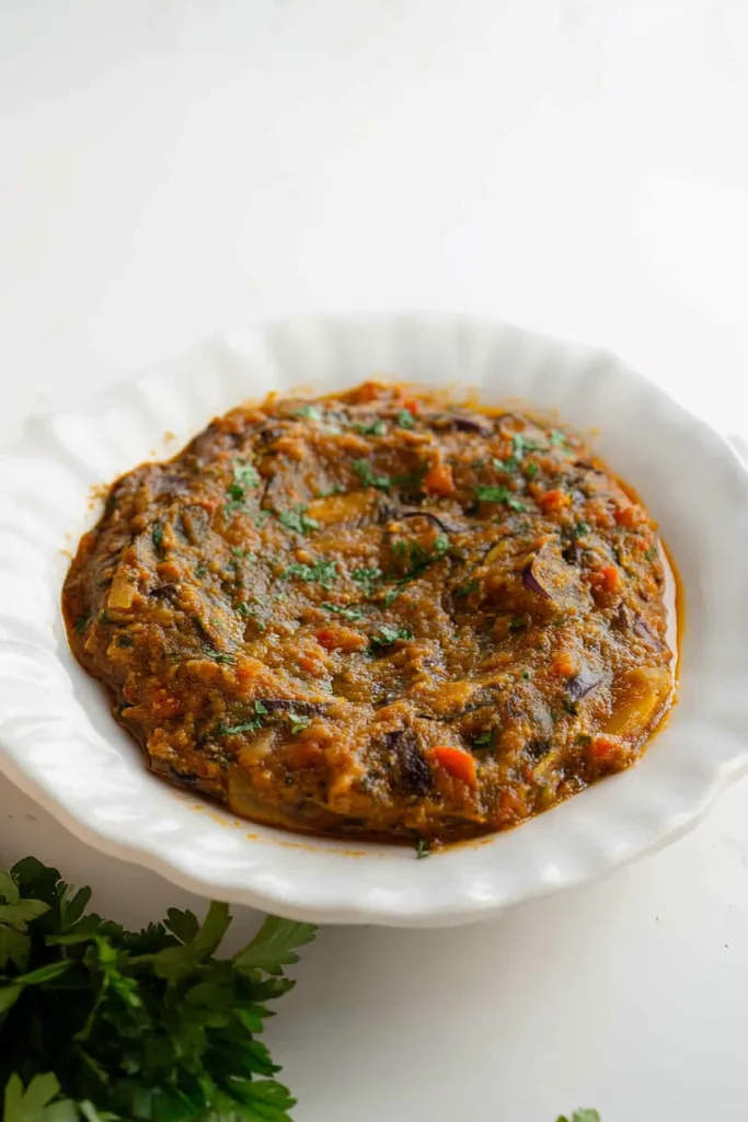 Homemade Mediterranean spread with eggplant and spices, styled for a comforting meal.