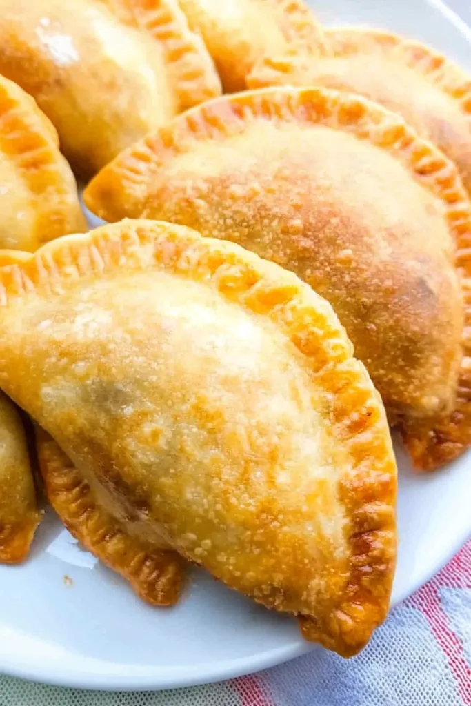 Pastelitos Recipe Beef Puerto Rican finished dish, showcasing the rich golden crust and sealed edges.