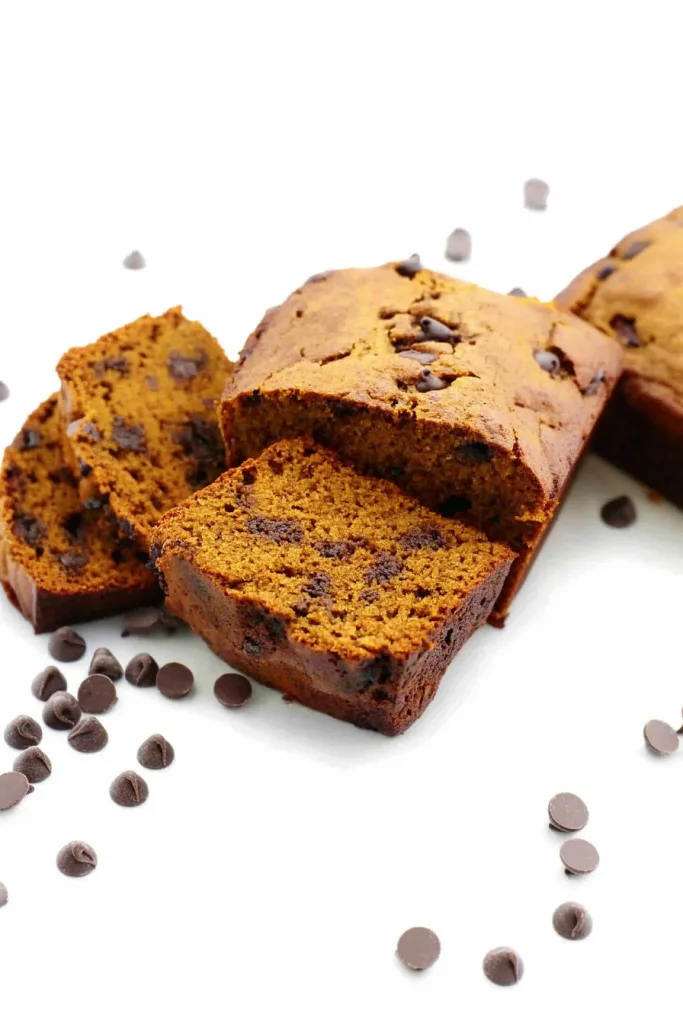 Rustic baked bread with golden crust and dark chocolate specks throughout