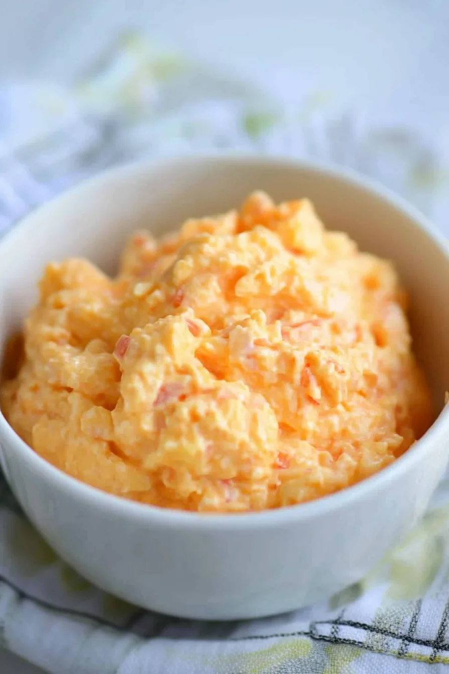 Frozen-style salad with airy texture and rich orange hue.