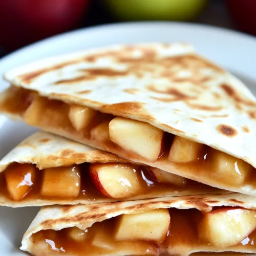 Plate of dessert quesadillas with glossy apple-cinnamon filling.