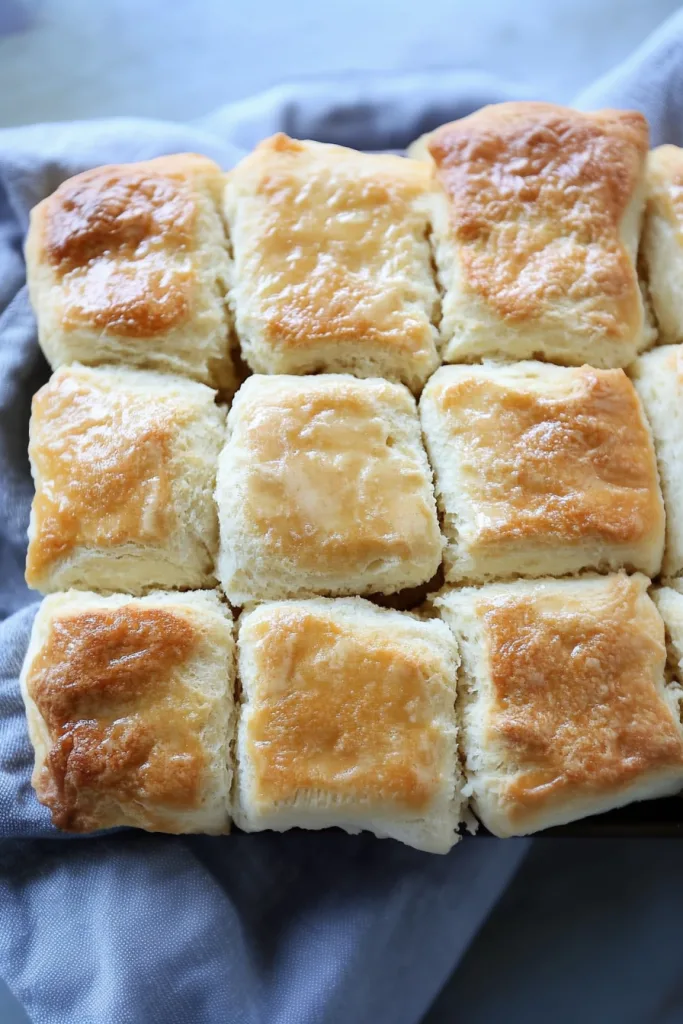 Warm biscuits with golden tops, ready to be served.