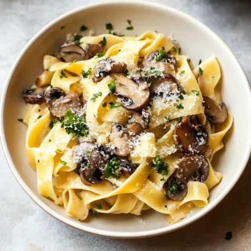 Tagliatelle tossed with sautรฉed mushrooms, herbs, and grated cheese.