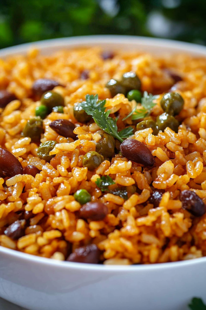 Moro de guandules dominicano plated with herbs, emphasizing its rich color.