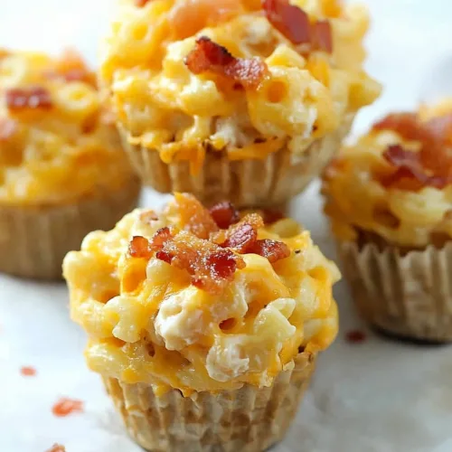 Close-up of creamy pasta cups with melted cheddar