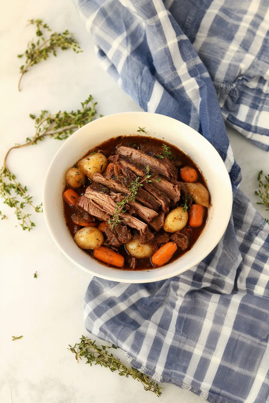 Tender beef chunks with carrots and potatoes in rich gravy.