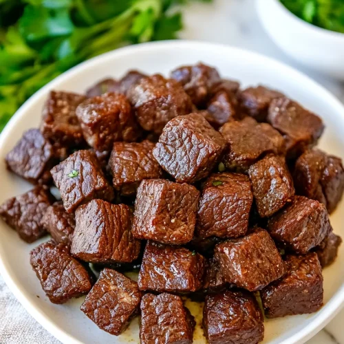 Tender beef chunks highlighting savory color contrast.