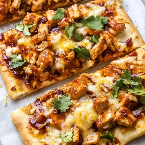 Crispy flatbread pizza loaded with chicken and herbs.