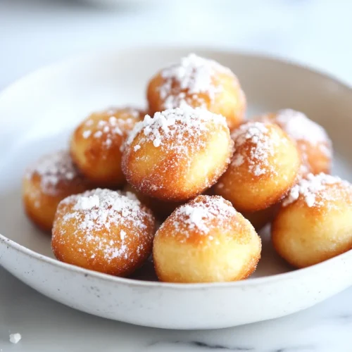 Closeโup of a fluffy fried treat with a crisp exterior and soft interior