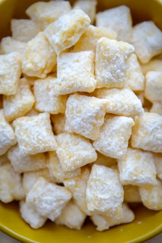 Close-up of citrus-flavored treats with a soft, powdery coating.