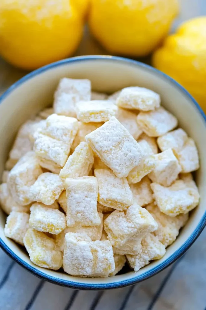 Sweet snack cubes highlighting bright citrus theme and sugar dusting.