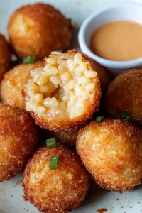 Hearty fried risotto balls with a crunchy exterior and soft center.
