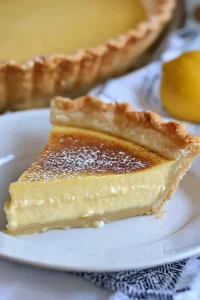 Classic homemade custard pie with a glossy, golden-brown top and tender filling.