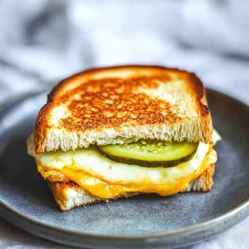 Sandwich served on a gray plate, highlighting crisp crust and melty center.