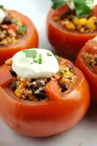 Golden light catching the glossy tomato skins and the hearty filling inside.