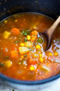 Bright, comforting soup showcasing vibrant vegetables in a rich broth.
